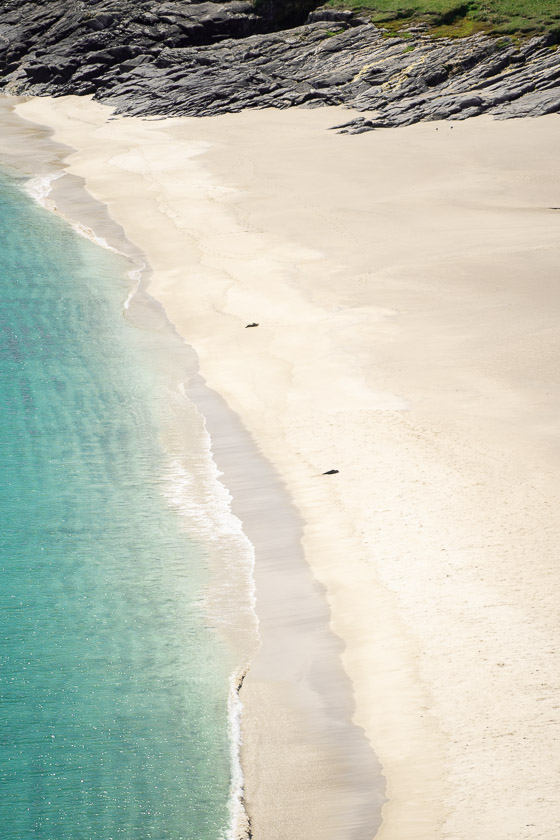 White sand beach on Mingulay with turquoise sea.