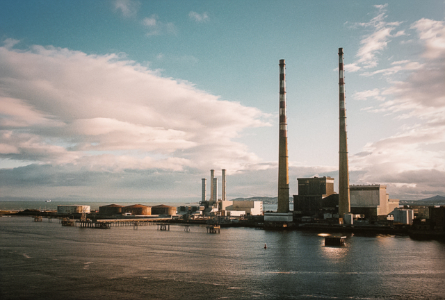 A factory in Dublin harbour at sunset